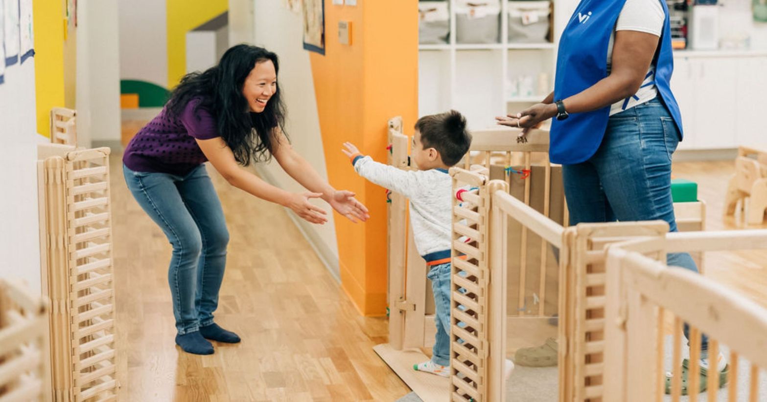 mom picking up child at daycare